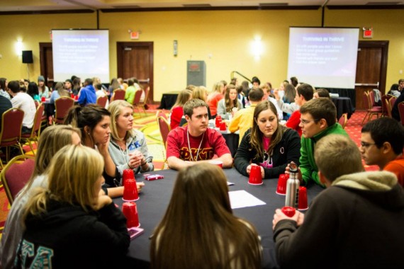 Students talking about mission back on campus